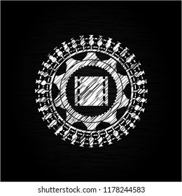 film icon inside chalkboard emblem on black board