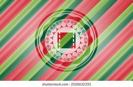 Icono de película dentro de los colores de Navidad estilo emblema. 