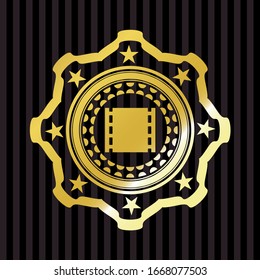 film icon inside golden badge or emblem
