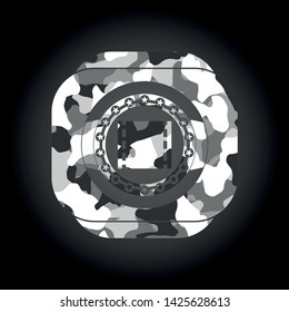 film icon inside grey camouflaged emblem