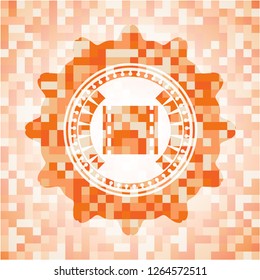 film icon inside orange mosaic emblem with background
