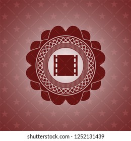 film icon inside red icon or emblem