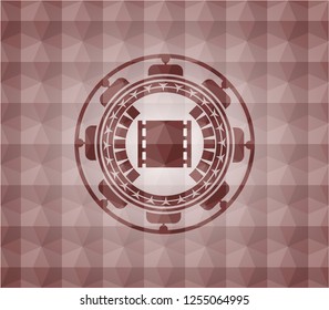 film icon inside red emblem or badge with abstract geometric pattern background. Seamless.