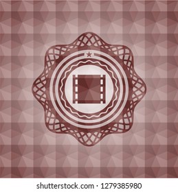 film icon inside red emblem or badge with abstract geometric polygonal pattern background. Seamless.
