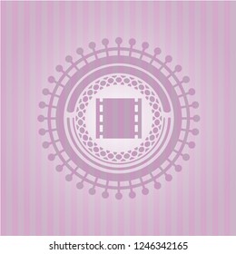 film icon inside retro pink emblem