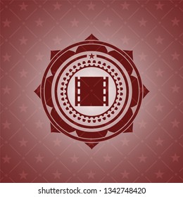 film icon inside retro style red emblem