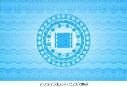film icon inside water concept emblem background.