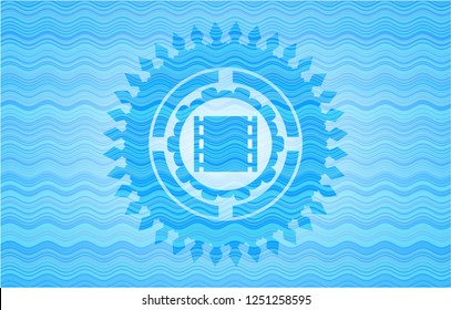 film icon inside water representation style emblem.