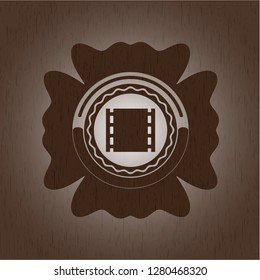 film icon inside wood emblem