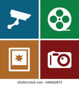 Film icons set. set of 4 film filled icons such as movie tape, photo, security camera