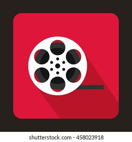 Film reel icon in flat style on a pink background