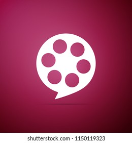 Film reel icon isolated on purple background. Flat design. Vector Illustration