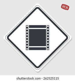 Film strip icon. Flat design style. Made in vector. Emblem or label with shadow.