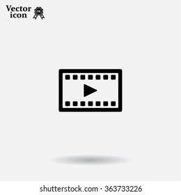 film strip with play - black vector icon