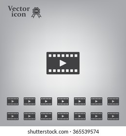 film strip with play - black vector icon