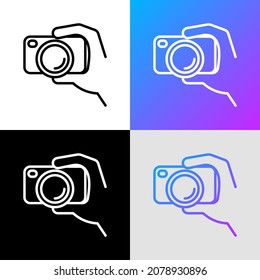 Filmando el vlog: icono de la línea delgada de la cámara en la mano. Ilustración vectorial moderna para el logotipo de vídeo.