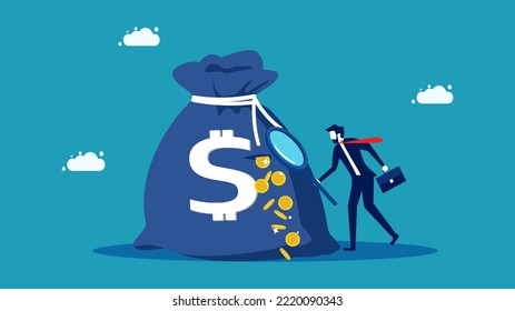 financial deficiencies. businessman uses a magnifying glass to see a leaking money bag