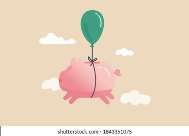 Financial freedom, growth retirement saving or rising profit investment for financial succeed concept, happy cute pink piggy bank floating fly to freedom in the sky minimal style. - Shutterstock ID 1843351075