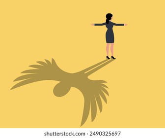 Financial freedom and hope. Business woman silhouette with wings behind.