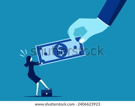 Financial problems, paying off debt. Businesswoman pulling banknotes in tug of war with big hand