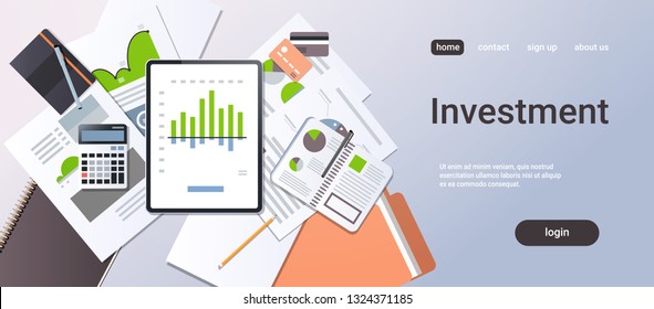 financial report investment business finance concept top angle view desktop tablet screen paper documents office stuff horizontal copy space