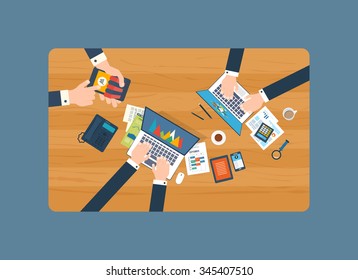 Financial report. Top view of a team working together on a project with documents and laptop. Concepts for business analysis, teamwork, project management. The strategy of a successful business. 