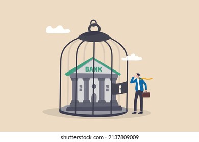 Financial Sanction Disconnect From SWIFT International Money Transfer, Lockdown Bank Transaction Against Russian War Concept, Businessman Look At Bank Building Locked Inside Bird Cage.