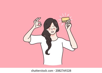 Financial stability and credit card concept. Young smiling asian woman holding golden credit card in raised hand showing ok sign gesture with hand vector illustration 