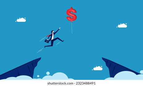 Financial success. Businessman jumping and grabbing dollar balloon