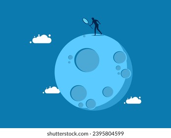 Find new markets. businessman uses a magnifying glass to examine the moon or planets