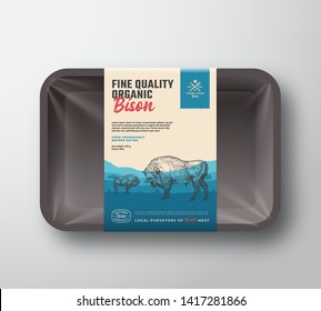 Fine Quality Organic Bison. Abstract Vector Meat Plastic Tray Container with Cellophane Cover. Vertical Packaging Design Label. Hand Drawn Buffalo Silhouettes Landscape Background Layout. Isolated