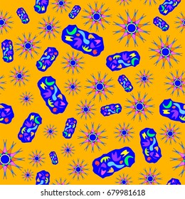 Fine seamless texture with abstract circles and details. Items are placed chaotic. Background is orange