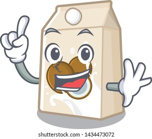 Finger coconut milk poured in cartoon glass