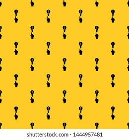 A finger pointer and light bulb pattern seamless vector repeat geometric yellow for any design