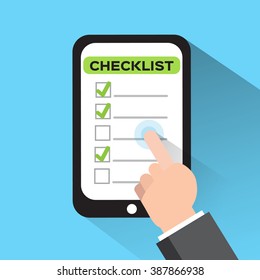 Finger pointing to checklist. Using mobile smart phone