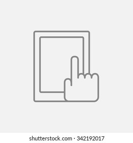 Finger pointing at tablet line icon for web, mobile and infographics. Vector dark grey icon isolated on light grey background.