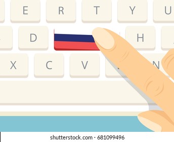 Finger pressing Russia flag key on computer keyboard