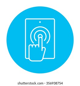 Finger touching digital tablet line icon for web, mobile and infographics. Vector white icon on the light blue circle isolated on white background.