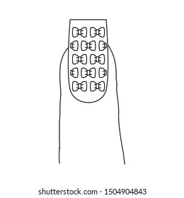 Fingernail with a pattern design. Last phalanx of a finger, showing a long nail with a design that includes head bows.