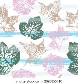 Fingerprint pattern from the of leaves painted in watercolor. Cute pattern of beautiful prints of leaves painted watercolor by hand. Mixed media artwork.