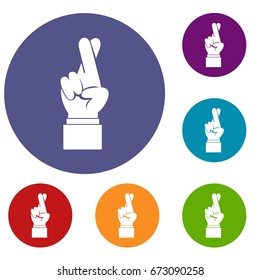 Fingers crossed icons set in flat circle reb, blue and green color for web