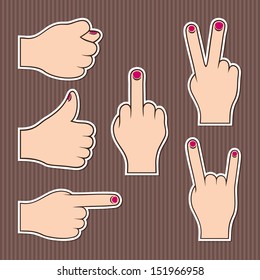 Fingers form different signs. Set of stickers on a brown striped background. 