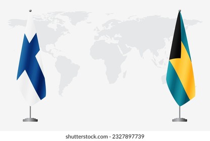 Finland and Bahamas flags for official meeting against background of world map.