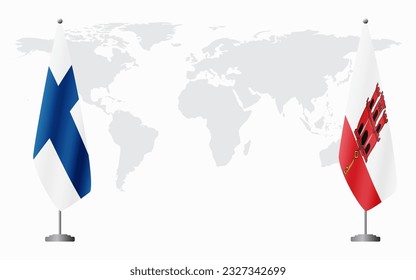 Finland and Gibraltar flags for official meeting against background of world map.