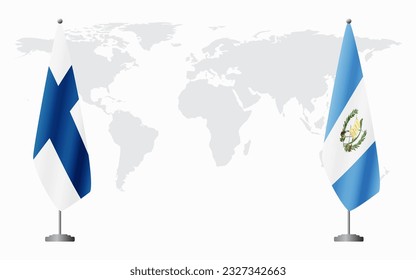 Finland and Guatemala flags for official meeting against background of world map.