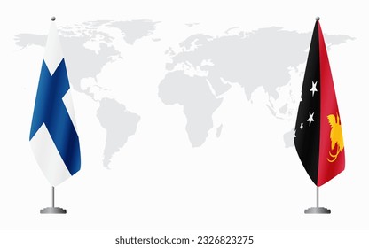 Finland and Papua New Guinea flags for official meeting against background of world map.