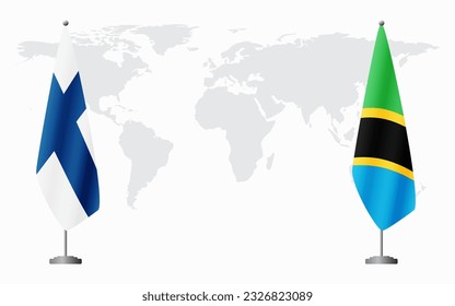 Finland and Tanzania flags for official meeting against background of world map.