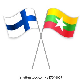 Finnish and Burmese crossed flags. Finland combined with Burma isolated on white. Language learning, international business or travel concept.