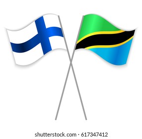 Finnish and Tanzanian crossed flags. Finland combined with Tanzania isolated on white. Language learning, international business or travel concept.