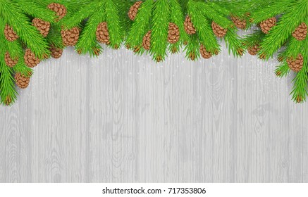 Fir tree branches top on white wood background